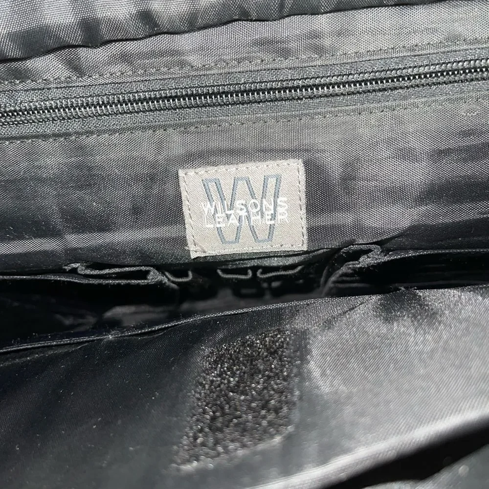 Wilson leather Black Leather Briefcase laptop Nylon side silver tone hardwares.